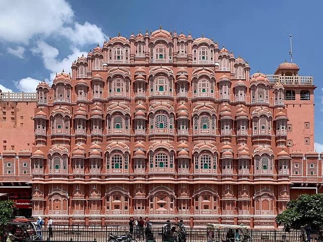 The pink sandstone facade of Hawa Mahal in Jaipur